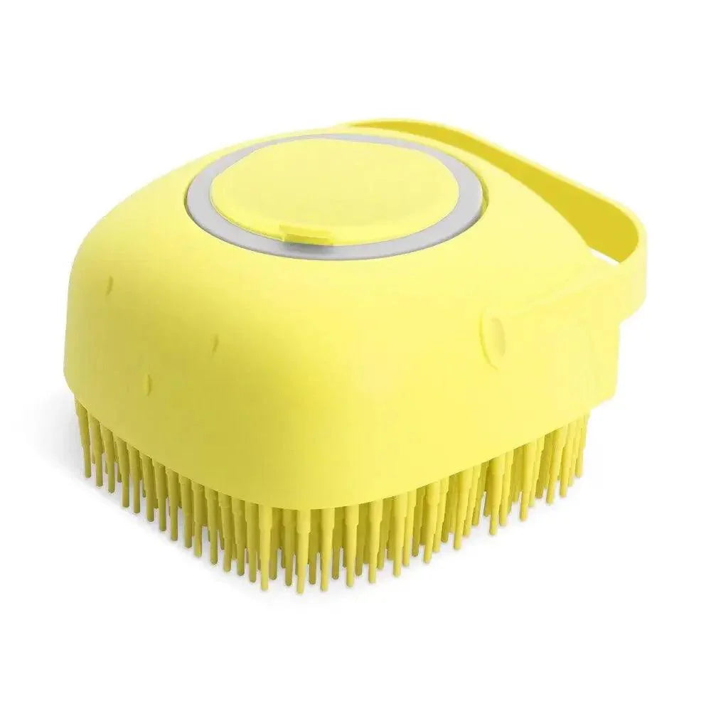 Yellow dog bath brush with silicone bristles and built-in shampoo dispenser.