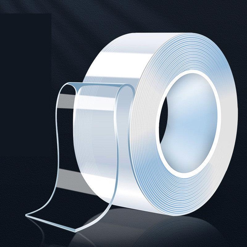 Double-sided adhesive tape roll, strong and reusable for multiple uses.