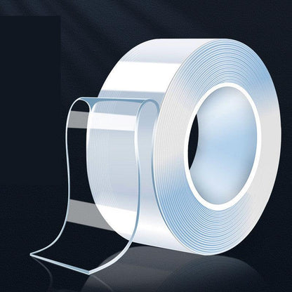 Double-sided adhesive tape roll, strong and reusable for multiple uses.