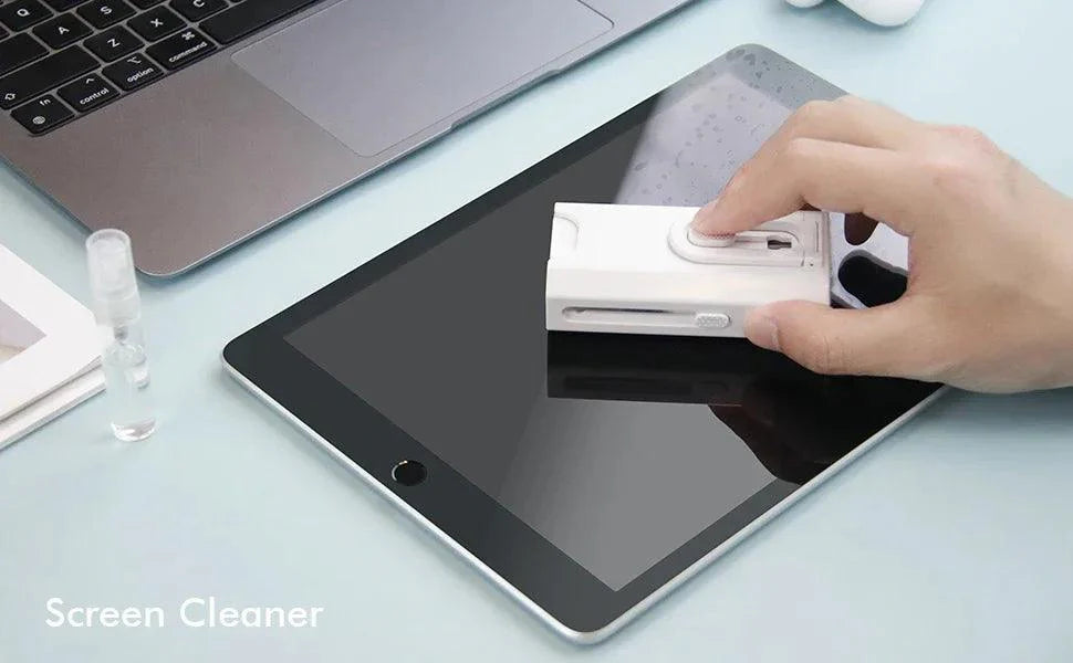 Cleaning tablet screen with 8 In1 Electronic Cleaner Kit.