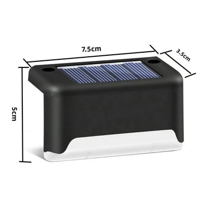 Garden Solar LED Light in black ABS with dimensions 7.5x5x3.5cm.