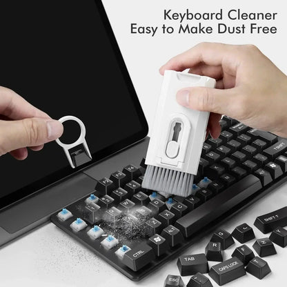 8 In1 Electronic Cleaner Kit cleaning a keyboard with soft brush and keycap remover.