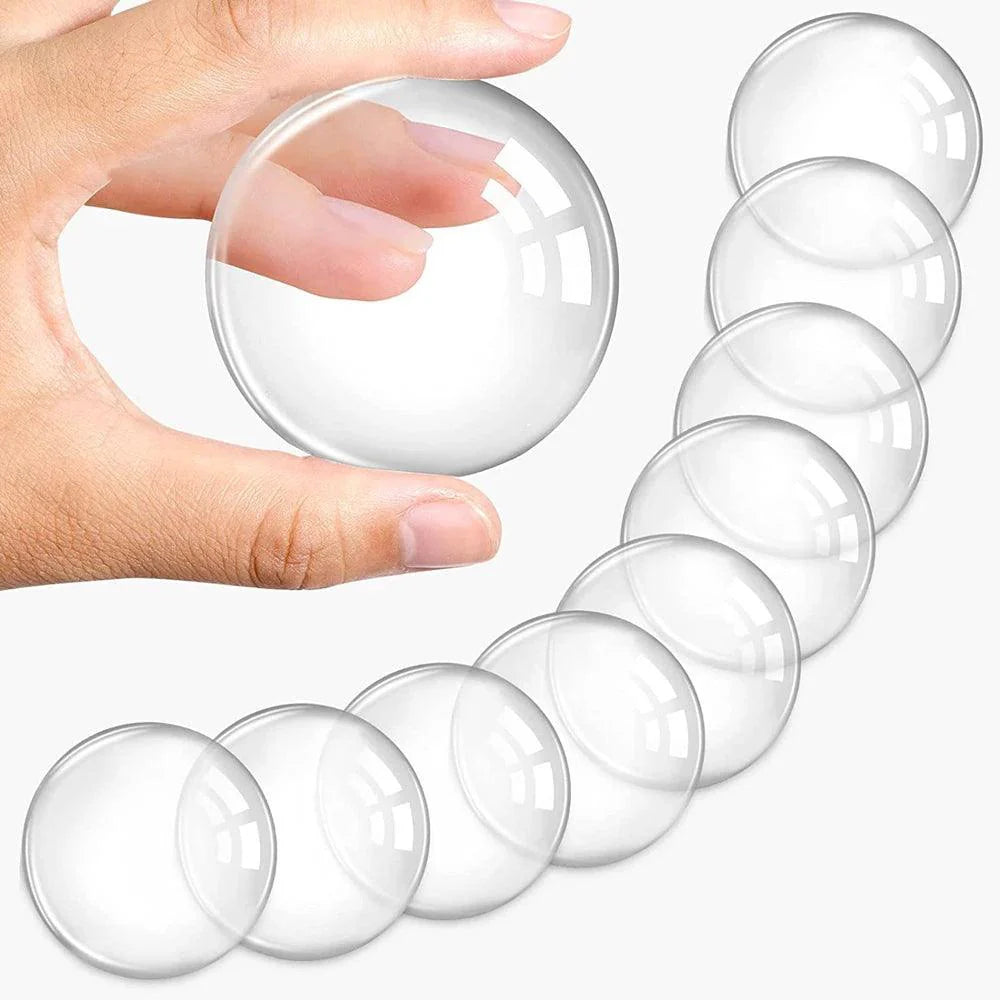 Round transparent soft silicone non-slip door stopper for home and office protection.