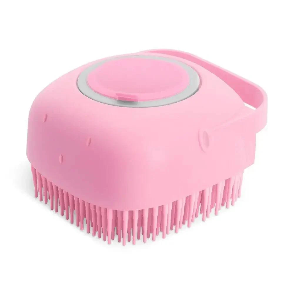 Pink Dog Bath Brush with silicone bristles and ergonomic handle for grooming and massaging.