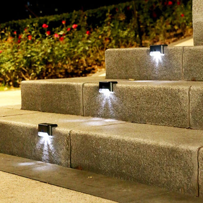 Garden Solar LED Lights illuminating stone steps at night.