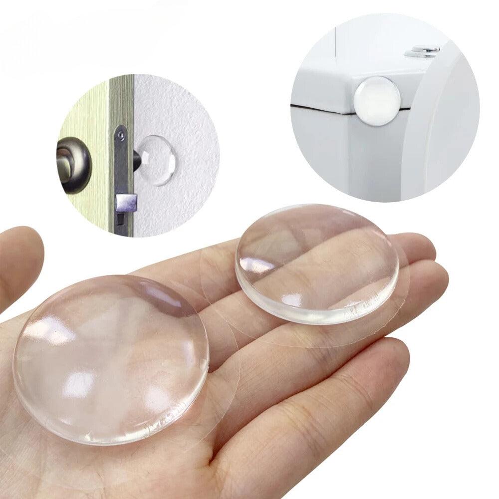 Round transparent soft silicone non-slip door stopper for impact absorption and wall protection.